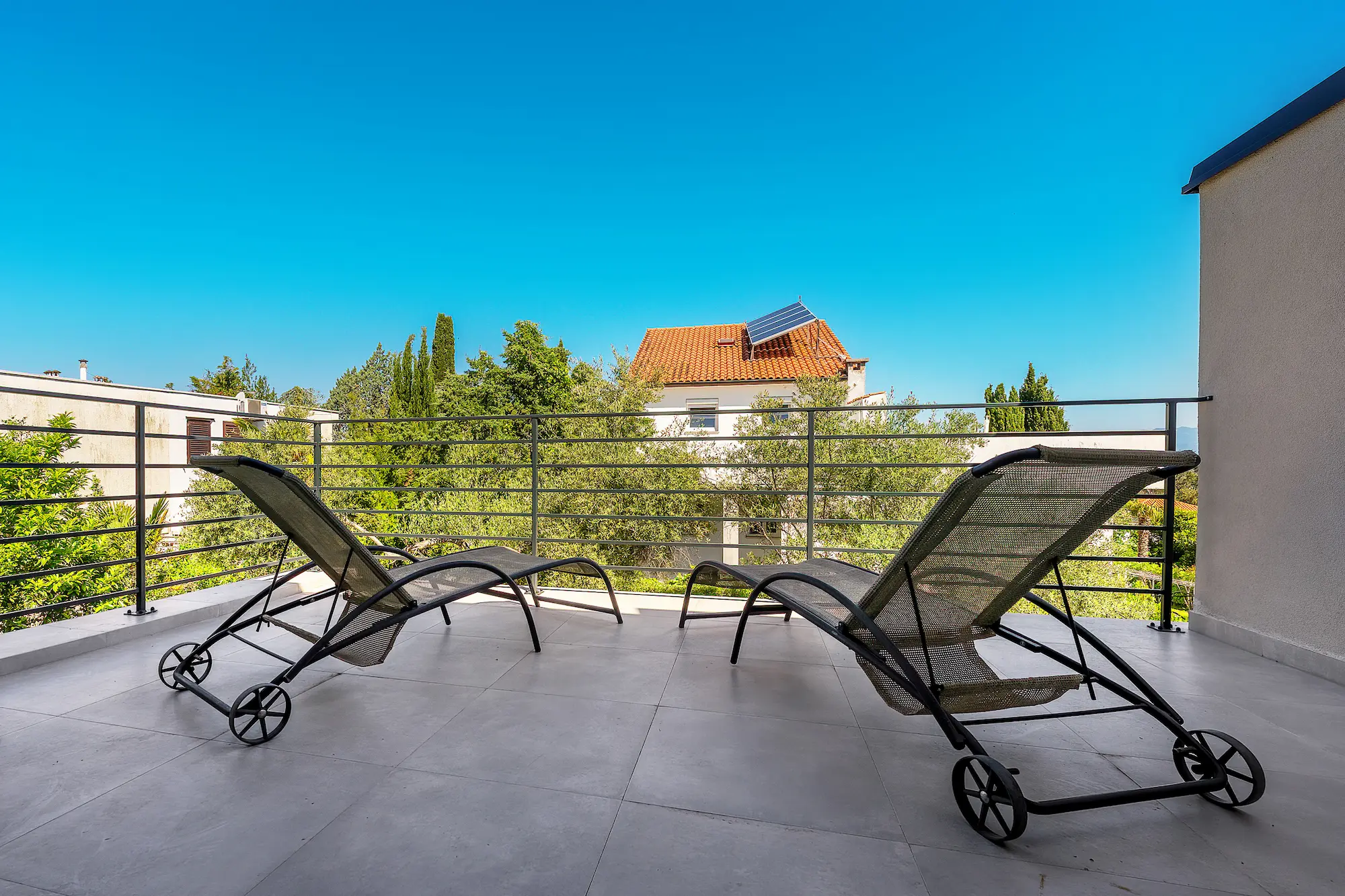 Private terrace with lounge chairs